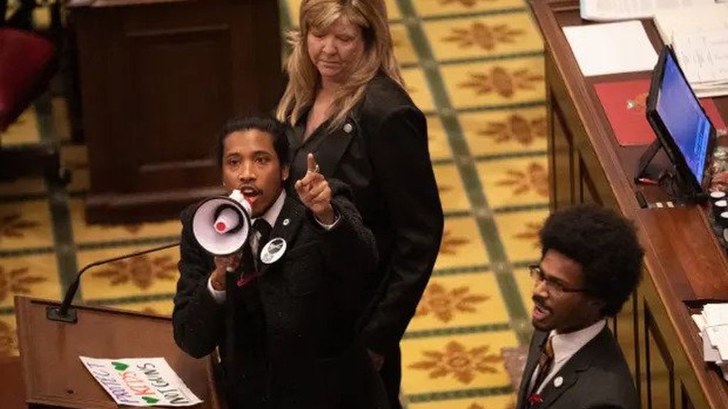 Representative Justin Jones calls on his colleagues to pass gun control legislation on Thursday at the state capitol in Tennessee