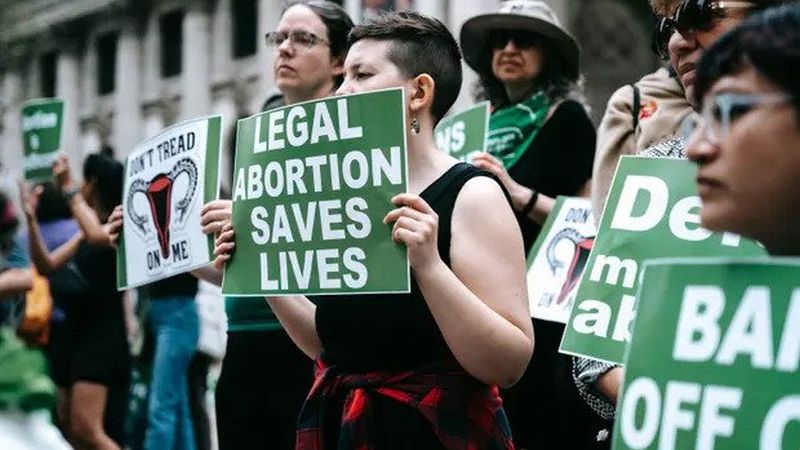 People in New York City protest the controversial decision of Judge Matthew Kacsmaryk